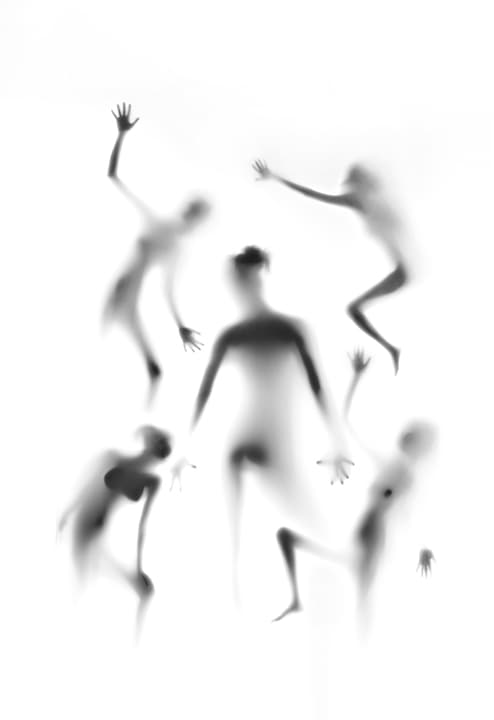Five blurred silhouettes leaping