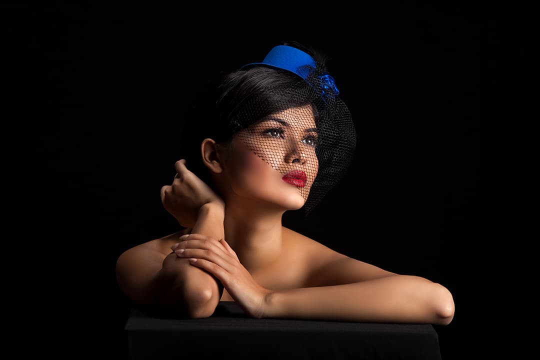Cobalt pillbox hat and birdcage veil